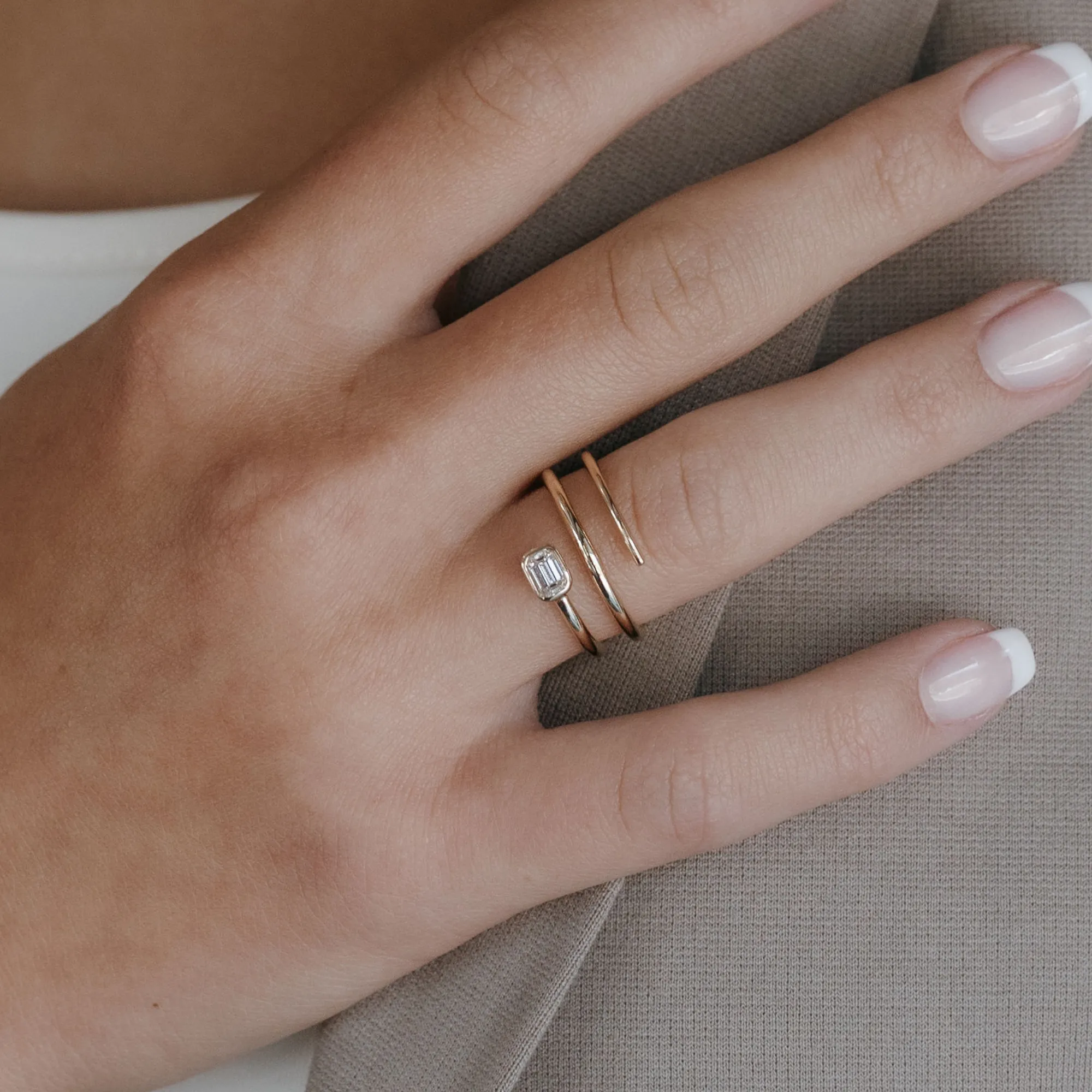 Bezel Set Emerald Cut Triple Wrap Ring