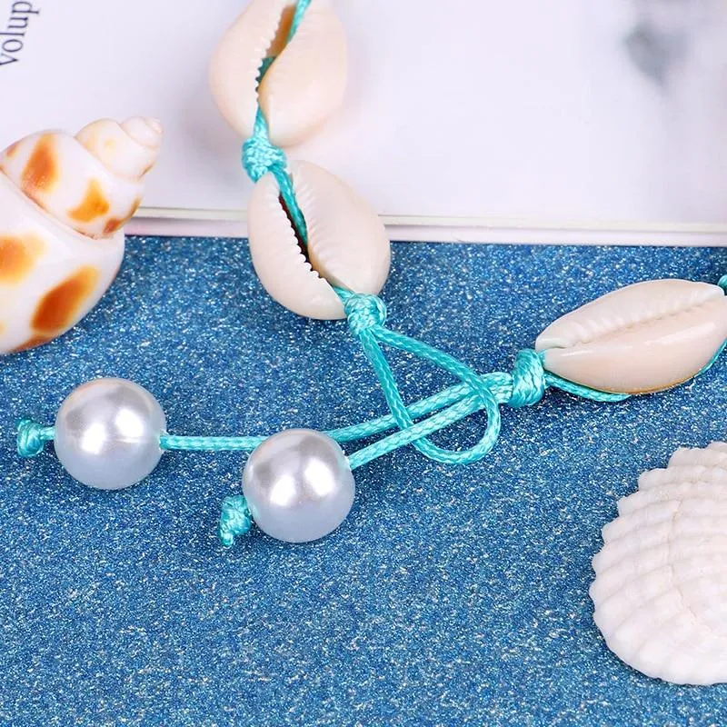 Blue Rope Puka Shell Necklace with Pearl Lock