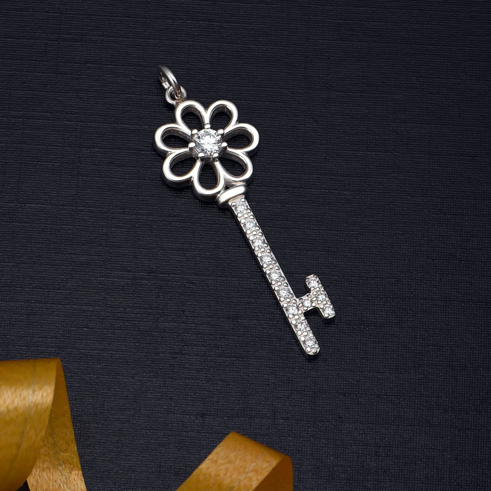 CZ Flower Key Sterling Silver Pendant