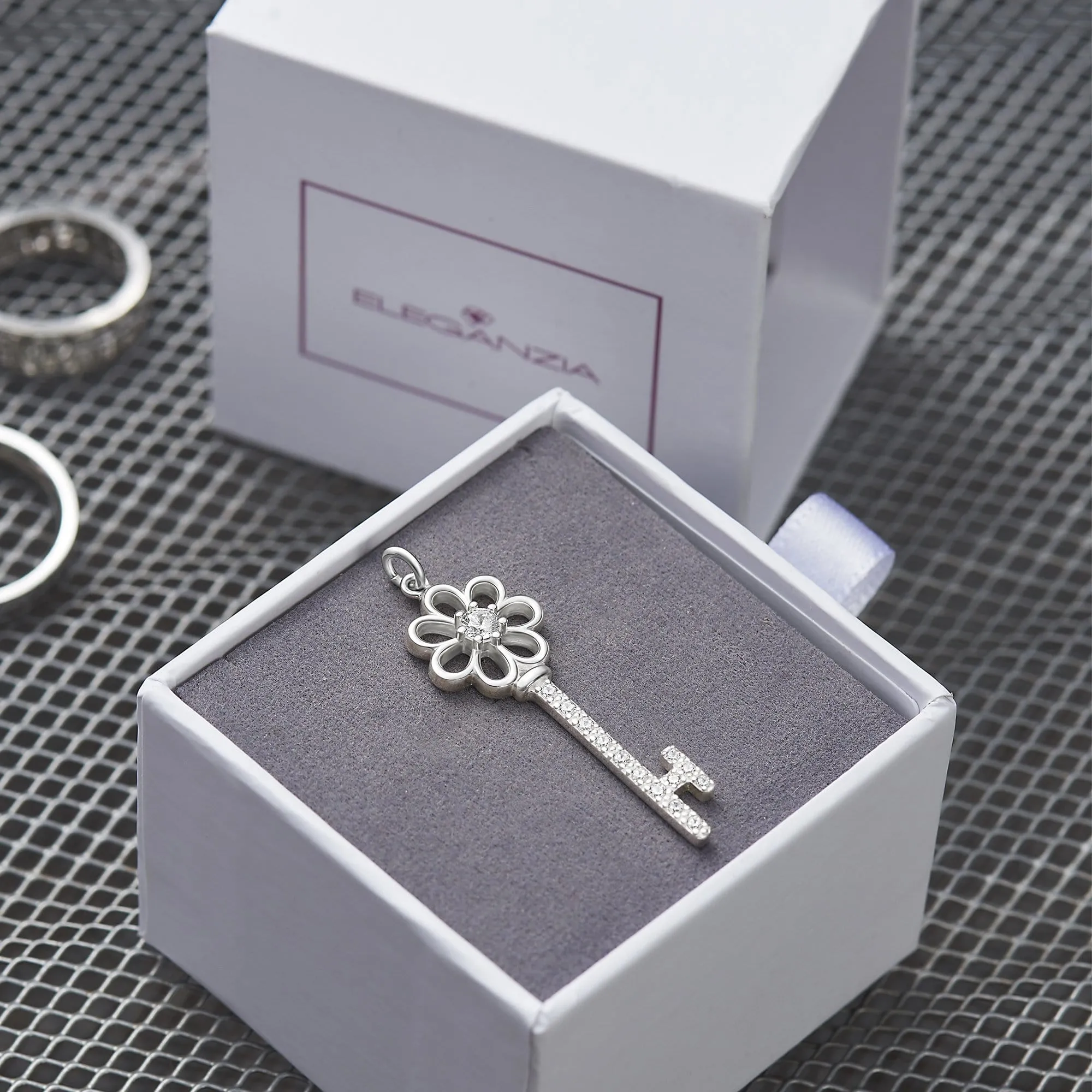 CZ Flower Key Sterling Silver Pendant