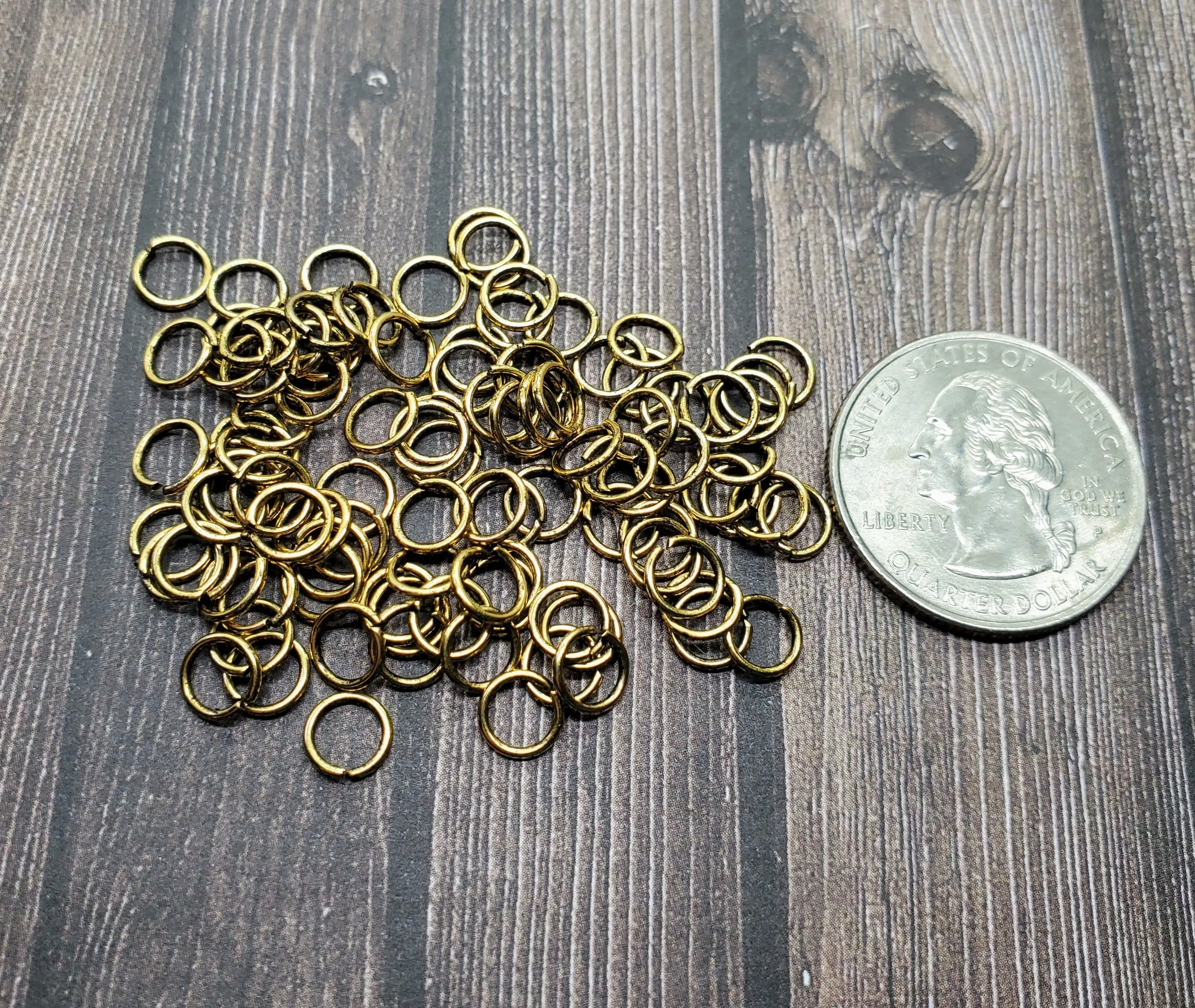 Matte Gold Ox 6mm Open Jump Rings (100) - GOBF14